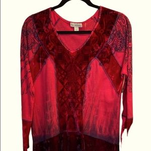 Woman’s 2piece top set.  Red velvet fibers are polyester.  The coat has a hood.